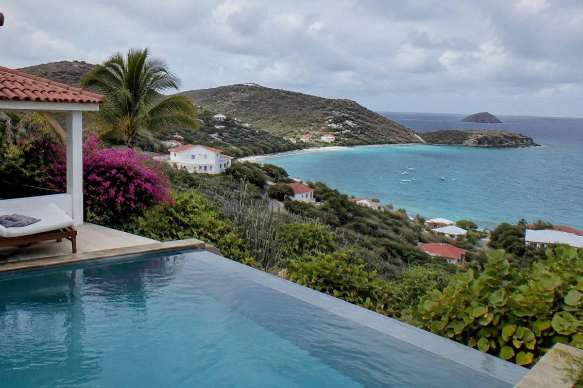 Private pool at a hillside villa facing the sea