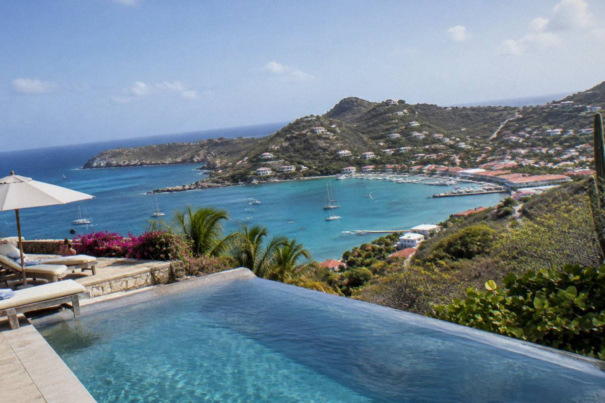 An infinity pool and terrace above the coastline of Saint Barthelemy near Gustavia