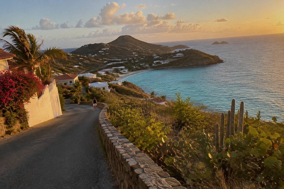 Coastal hillside road curving above the sea on a Caribbean headland