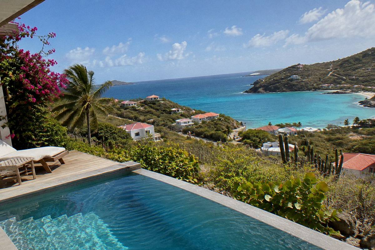 Private villa terrace with plunge pool and wide sea horizon